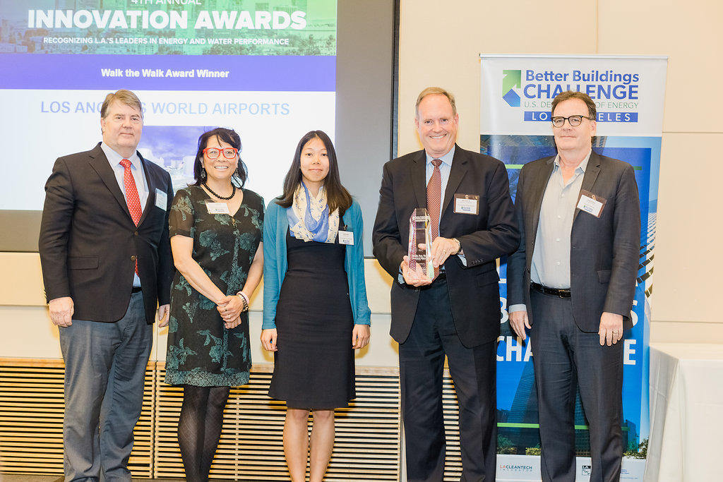 Several members of LAWA pose for a picture after receiving award.